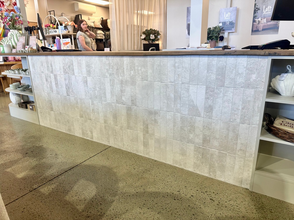 NAT016 Zion Coconut Matt 6.2x25  - Counter in commercial store.jpg